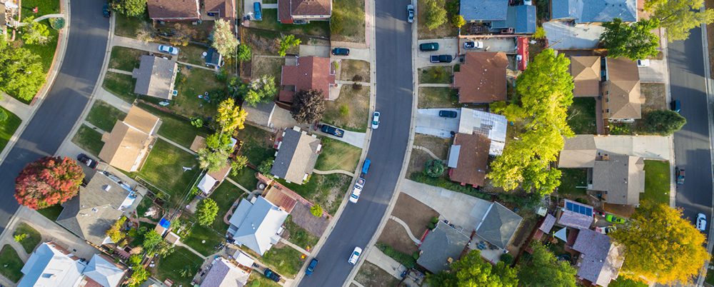 Stock aerial image of neighborhood, used as header for top-selling MPCs year-end 2020